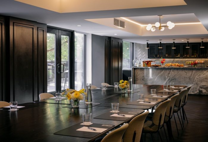 The Anndore House, part of JVD by Hyatt, gay-friendly hotel. Meeting room with long table, catering, and modern design.