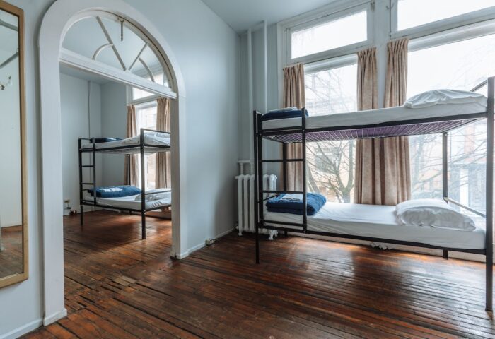 The Cambie Hostel Gastown dorm room. Budget-friendly, gay-friendly hotel with bunk beds and wooden floors. Ideal for gay travelers.
