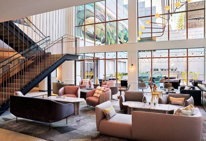 The Clancy Autograph Collection gay-friendly hotel lobby. Modern design, stylish seating, and large windows. Great for gay travel.