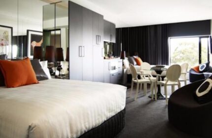 The Cullen Melbourne Art Series gay-friendly hotel room. Modern interior with bed, dining area, and stylish decor. Perfect for gay travelers.