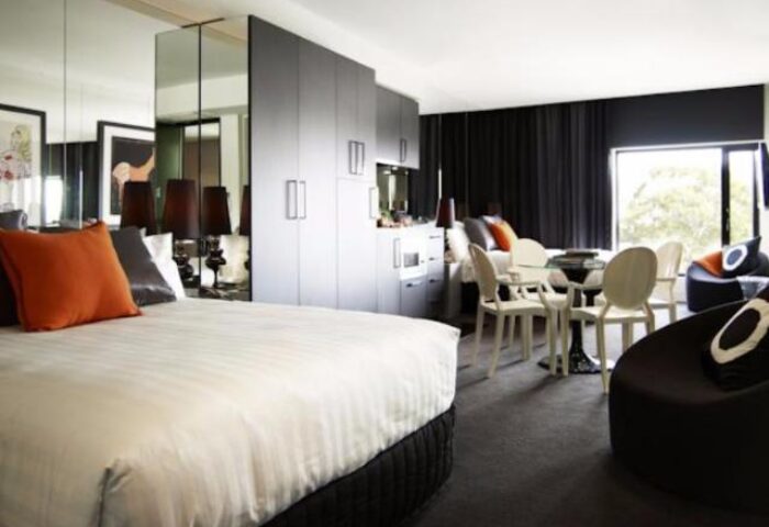 The Cullen Melbourne Art Series gay-friendly hotel room. Modern interior with bed, dining area, and stylish decor. Perfect for gay travelers.