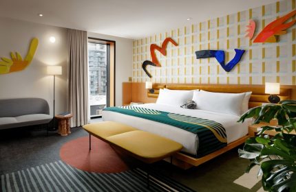 The Drake Hotel's gay-friendly room boasts modern art, a king bed, and city views. This hotel is a top choice for gay men travel.