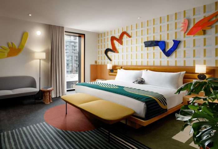 The Drake Hotel's gay-friendly room boasts modern art, a king bed, and city views. This hotel is a top choice for gay men travel.