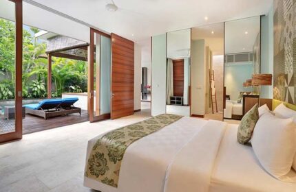 Elysian Boutique Villa Hotel gay-friendly suite. Luxurious bedroom with pool view. Gay travel, boutique hotel, villa, hotel room.
