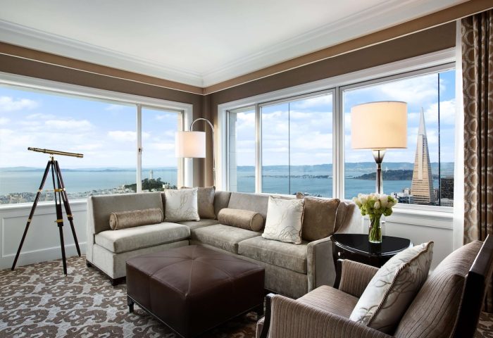 Fairmont San Francisco Hotel suite with telescope, bay view, and Transamerica Pyramid. Gay-friendly hotel for gay men travel advice.