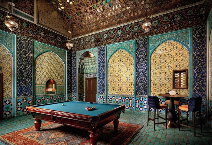 Gay-Friendly Hotel The Fairmont San Francisco Hotel billiard room. Ornate, Moorish-style design with pool table and bar. Luxurious gay travel.