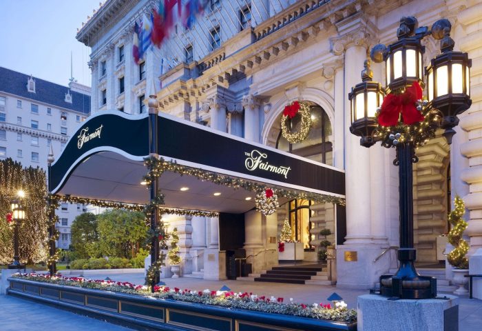 The Fairmont San Francisco Hotel entrance, a gay-friendly hotel, decorated for the holidays. A luxury travel destination.