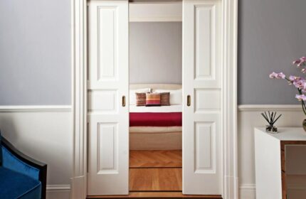 Bedroom view through sliding doors at The Fifteen Keys Hotel, a gay-friendly, pet-friendly hotel. Stylish interior design.
