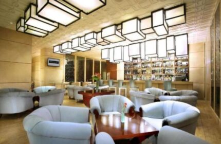 The Grove Suites by GRAND ASTON's gay-friendly hotel bar. A stylish lounge area with armchairs, tables, and a well-stocked bar for gay travelers.