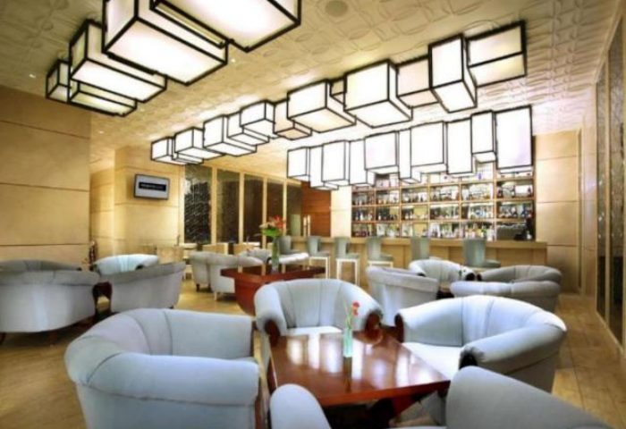 The Grove Suites by GRAND ASTON's gay-friendly hotel bar. A stylish lounge area with armchairs, tables, and a well-stocked bar for gay travelers.