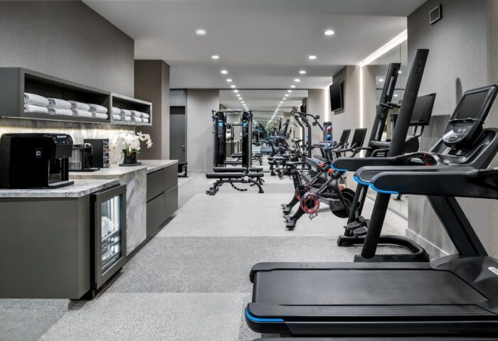Hazelton Hotel's gym. Treadmills, bikes, & weights for gay travelers. Towels, coffee, and water available. A gay-friendly hotel.