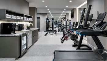 Hazelton Hotel's gym. Treadmills, bikes, & weights for gay travelers. Towels, coffee, and water available. A gay-friendly hotel.