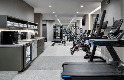 Hazelton Hotel's gym. Treadmills, bikes, & weights for gay travelers. Towels, coffee, and water available. A gay-friendly hotel.