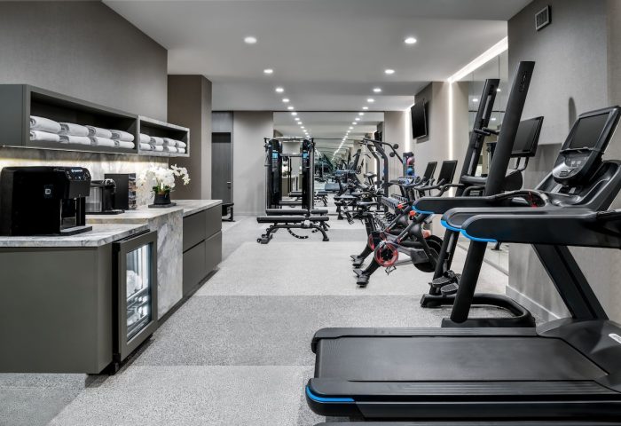 Hazelton Hotel's gym. Treadmills, bikes, & weights for gay travelers. Towels, coffee, and water available. A gay-friendly hotel.