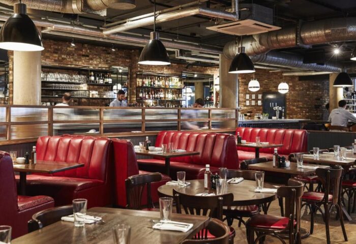 The Hoxton, Shoreditch's stylish restaurant with red leather booths and a bar. A gay-friendly hotel in London's vibrant Shoreditch area.