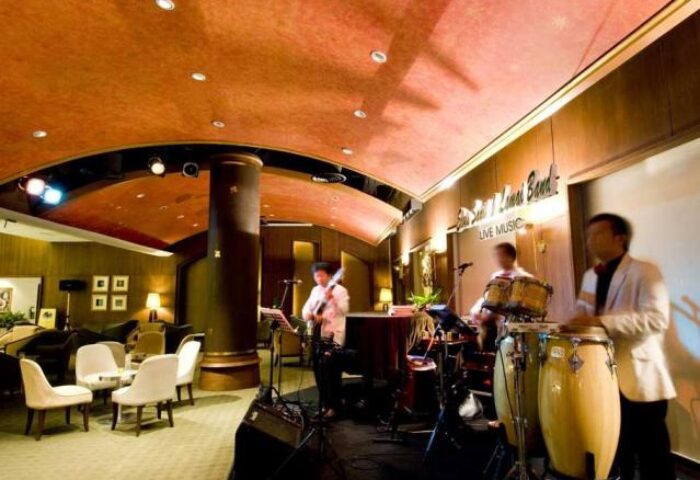 Live music at The Imperial Mae Ping Hotel, a gay-friendly hotel. Band playing in the lounge area. Chiang Mai, Thailand hotel.