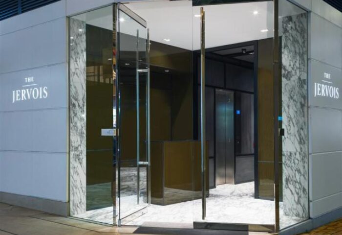 Entrance to The Jervois, a gay-friendly hotel. Modern design with marble accents. A great choice for gay travelers.