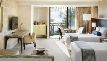Gay-friendly hotel: The London West Hollywood at Beverly Hills room with twin beds, desk, and balcony. Upscale lodging for gay travelers.