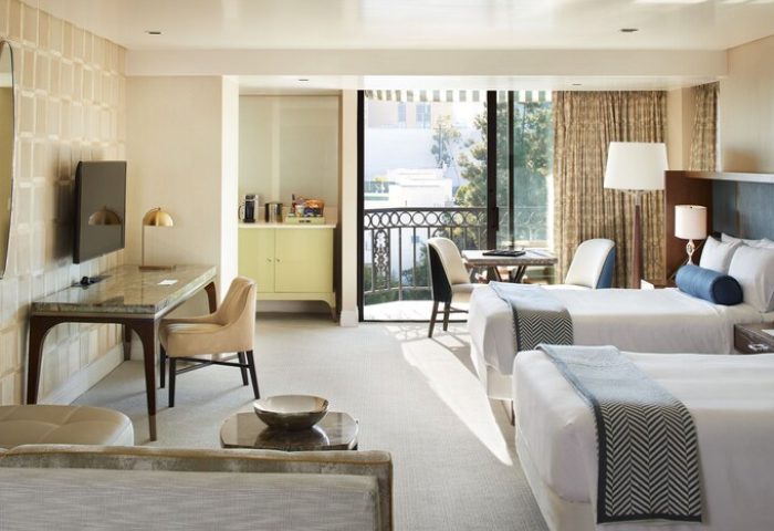 Gay-friendly hotel: The London West Hollywood at Beverly Hills room with twin beds, desk, and balcony. Upscale lodging for gay travelers.