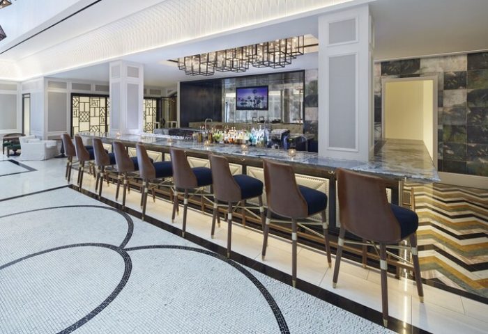 The London West Hollywood at Beverly Hills' bar. Upscale gay-friendly hotel with stylish bar stools and marble counter. Modern design.