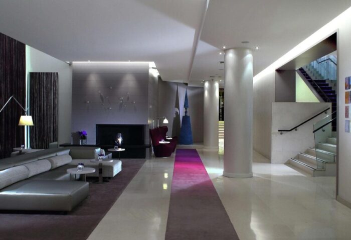 The Morrison, a DoubleTree by Hilton Hotel lobby. Gay-friendly hotel with modern design, lounge area, and staircase. Dublin, Ireland.