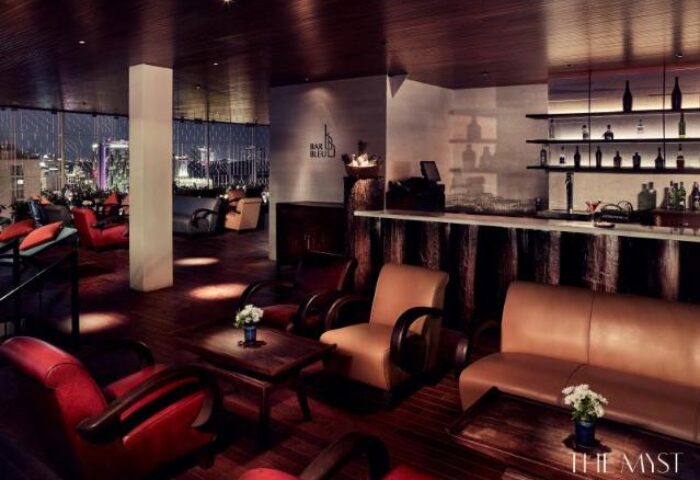 The Myst Dong Khoi's stylish bar. Gay-friendly hotel in Ho Chi Minh City, Vietnam. Features chic seating, city views, and a relaxed atmosphere.