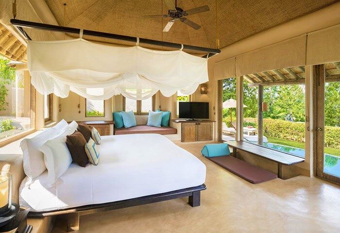 Gay-friendly The Naka Island, a Luxury Collection Resort & Spa, Phuket. Villa bedroom with pool view. Gay travel advice, Phuket hotels.