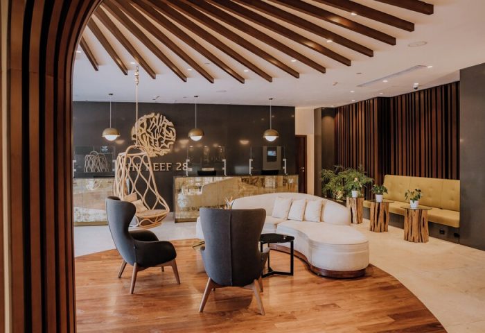 The Reef 28 Hotel & Spa lobby. Luxury adults-only all-suites hotel interior. Gay-friendly travel destination with optional all-inclusive.