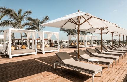 The Reef 28 Hotel & Spa rooftop pool area. Luxury adults-only all-suites resort with optional all-inclusive for gay travelers.