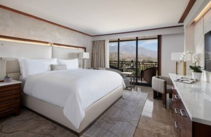 Gay-friendly hotel The Ritz-Carlton, Rancho Mirage: Luxurious room with balcony view. Upscale travel for gay men seeking comfort and style.