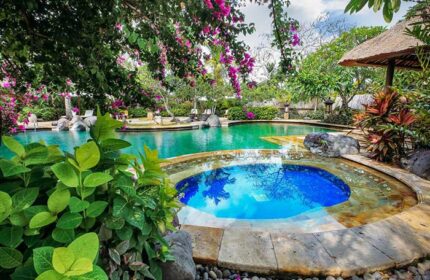 The Royal Beach Seminyak Bali MGallery Collection pool. Gay-friendly hotel with lush tropical gardens and inviting blue water.