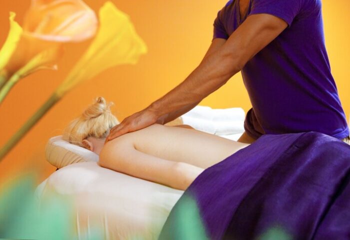 Massage at The Saguaro Palm Springs, a gay-friendly hotel. Relaxing spa treatment for LGBTQ travelers in Palm Springs. Wellness and self-care.