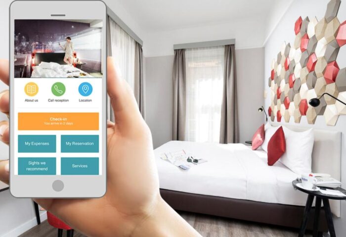 The Three Corners Hotel Art Superior: App view of a modern room in this gay-friendly hotel. Check-in, expenses, and reservations are easily accessible.