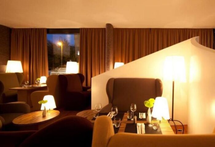 The Weinmeister Berlin-Mitte Adults Only hotel lounge. Gay-friendly, pet-friendly hotel interior with warm lighting and cozy seating.