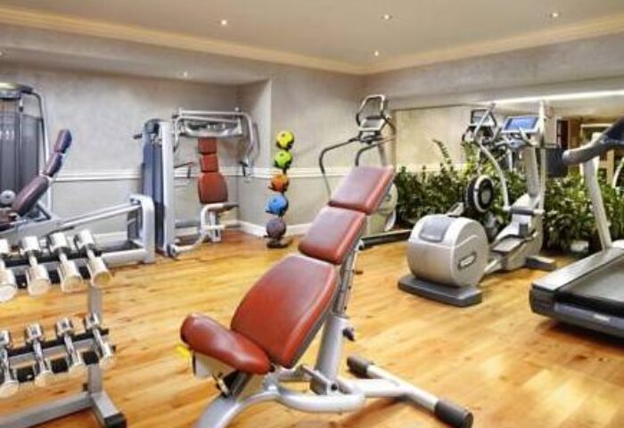 Gym at The College Green Dublin Hotel, Autograph Collection. Gay-friendly hotel with weights, treadmill, and exercise equipment.