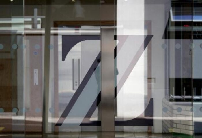 Entrance to The Z Hotel Piccadilly, a gay-friendly hotel. Glass doors with Z logo. A great place for gay men to stay in London.