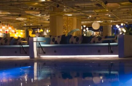 Tijili Hotel Seminyak pool view. Gay-friendly hotel with stylish design, comfy seating and vibrant lighting. Perfect for gay travel in Seminyak.