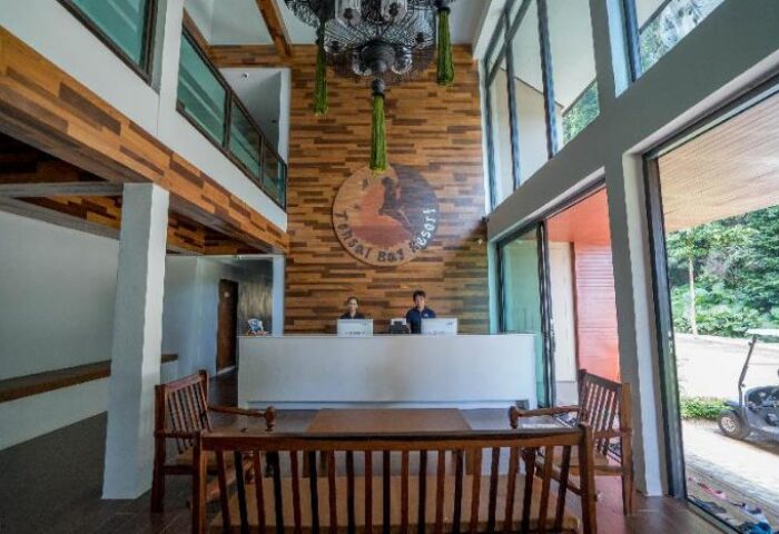 Tonsai Bay Resort lobby. Gay-friendly hotel reception area with staff. Modern design, natural light. Great for gay men travelers.