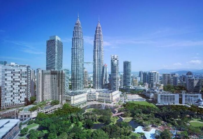 Kuala Lumpur skyline view from Traders Hotel, a gay-friendly hotel. Petronas Towers and cityscape visible.