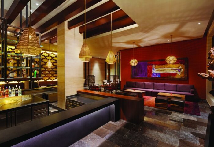 Turquoize at Hyatt Ziva Cancun adults-only all-inclusive gay-friendly hotel bar. Upscale lounge with seating, bar, and stylish lighting.