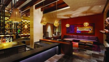 Turquoize at Hyatt Ziva Cancun adults-only all-inclusive gay-friendly hotel bar. Upscale lounge with seating, bar, and stylish lighting.