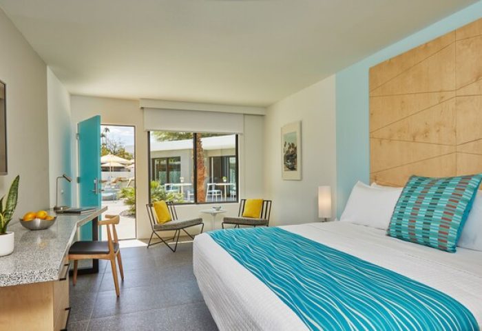 Twin Palms Resort, Palm Springs gay men's resort, guest room. Modern design, pool view. Gay-friendly hotel with stylish decor.