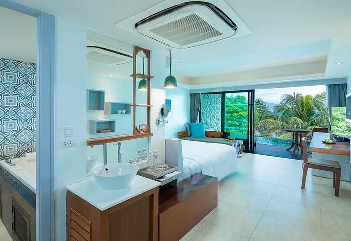 U Zenmaya Phuket Resort gay-friendly hotel room. Modern design with pool view, king bed, and stylish bathroom. Perfect for gay travelers.