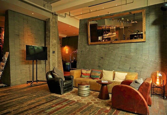URBN Boutique Shanghai's gay-friendly hotel lounge area. Stylish seating, modern design, and a welcoming atmosphere for LGBTQ+ travelers.