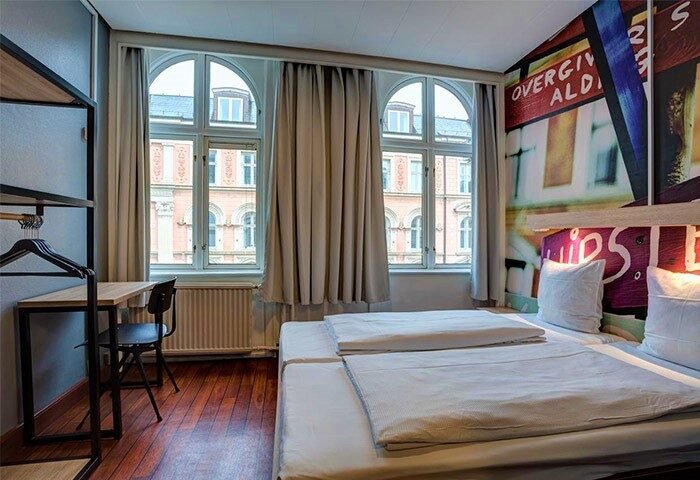 Urban House Copenhagen by MEININGER: Modern room at this gay-friendly hotel. Features twin beds, desk, closet, and city view.