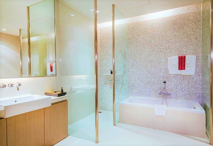 Bathroom at Veranda High Resort Chiang Mai - MGallery, a gay-friendly hotel. Features a bathtub, shower, sink, and modern design.