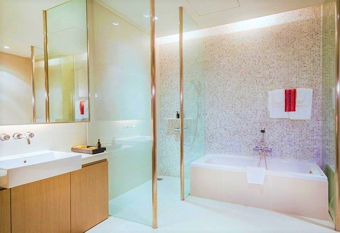 Bathroom at Veranda High Resort Chiang Mai - MGallery, a gay-friendly hotel. Features a bathtub, shower, sink, and modern design.