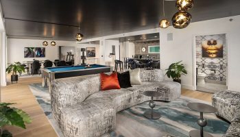 Virgin Hotels Las Vegas, Curio Collection by Hilton: Gay-friendly hotel lounge with a pool table, bar, and stylish seating area.
