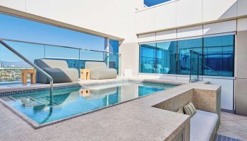Rooftop pool at Virgin Hotels Las Vegas, Curio Collection by Hilton. A gay-friendly hotel with modern design and city views. Perfect for gay travel.