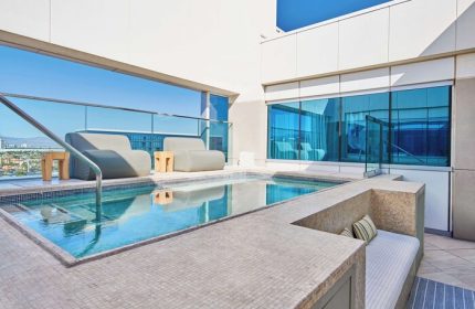 Rooftop pool at Virgin Hotels Las Vegas, Curio Collection by Hilton. A gay-friendly hotel with modern design and city views. Perfect for gay travel.